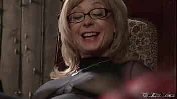 Blonde mature lezdom Nina Hartley in sheer full body lingerie rides face to bound redhead MILF lesbian Maitresse Madeline Marlowe then anal fucks her video